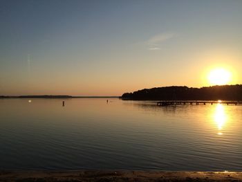 Scenic view of sunset over river