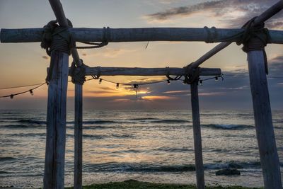 Scenic view of sea against sky at sunset