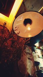 Low angle view of illuminated lamp