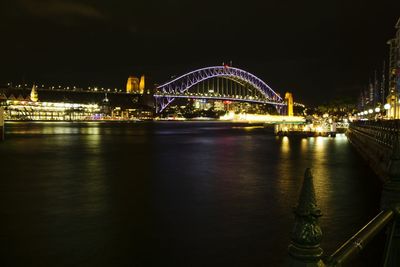 Illuminated ferris wheel at night