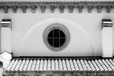 Close-up of camera on brick wall