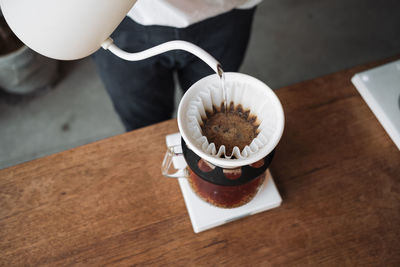 High angle view of coffee cup on table