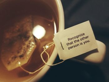 Close-up of message on green tea