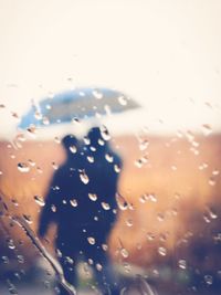 Full frame shot of wet glass window