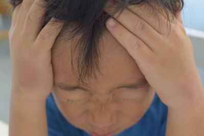 Close-up of depressed boy