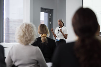 Woman having presentation during business meeting