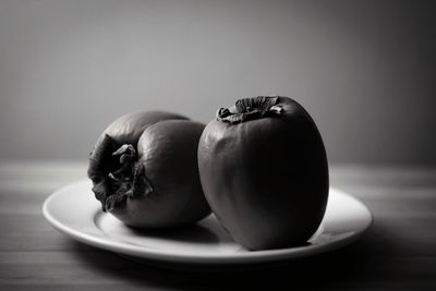 Close-up of fruits in plate on table