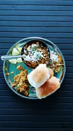 Directly above shot of breakfast served in plate on table