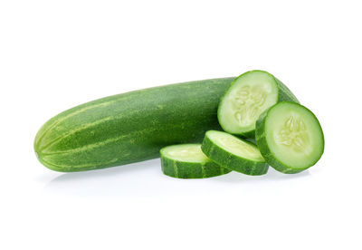 Close-up of green pepper against white background