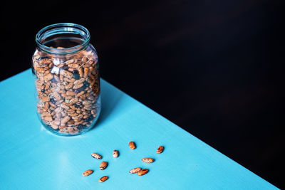 Close-up of drink in glass jar on table