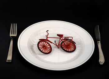 Close-up of food on table against black background