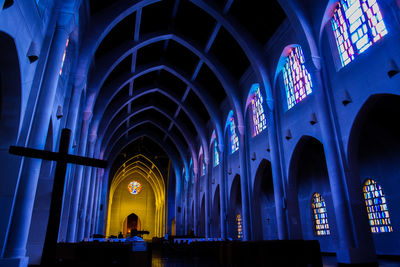 Low angle view of illuminated building at night