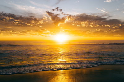 Scenic view of sea at sunset