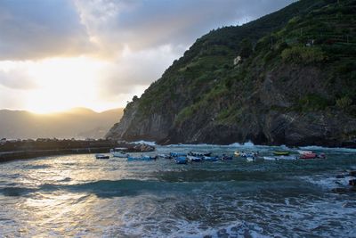 Scenic view of beach against sky during sunset