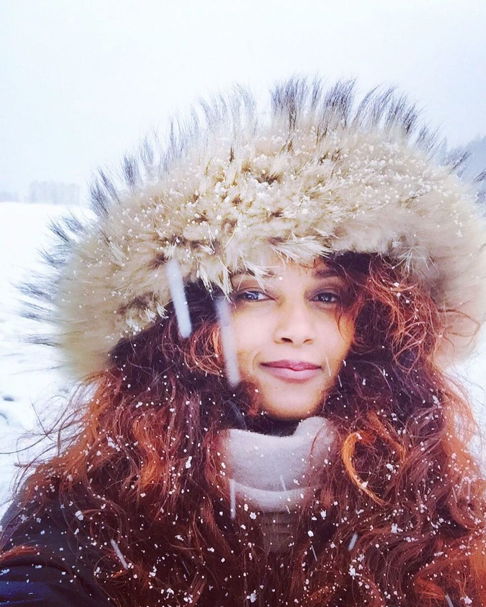 winter, warm clothing, cold temperature, snow, looking at camera, portrait, smiling, weather, knit hat, happiness, young adult, fur hat, one person, snowing, fur, nature, winter coat, headshot, scarf, cheerful, outdoors, people, leisure activity, adults only, rural scene, close-up, snowflake, day, beauty in nature, adult, human body part, sky, only men, one man only