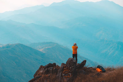 Rear view of man looking at mountain