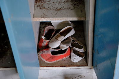 High angle view of abandoned shoes