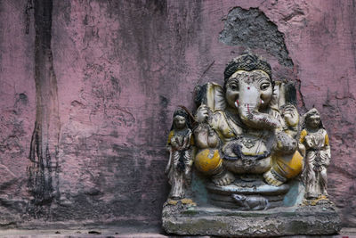 Slightly damaged idol of the hindu god ganesha 