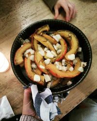 Midsection of woman preparing food