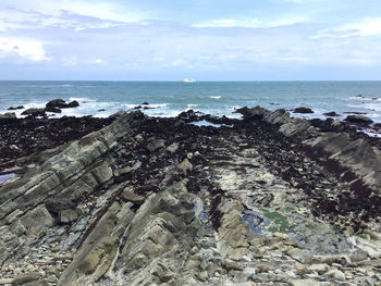 Scenic view of sea with the mesozoic cretaceous strata