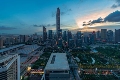 High angle view of buildings against sky during sunset