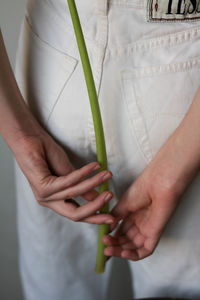 Midsection of woman holding ice cream