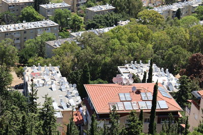 High angle view of townscape and trees in town