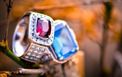 Red rhodolite and london blue topaz rings