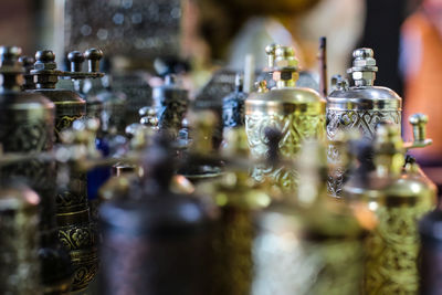 Close-up of wine bottles on display at store