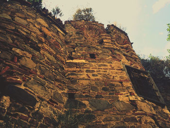 Low angle view of old building against sky