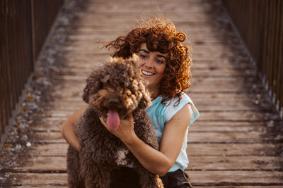 Portrait of woman with dog