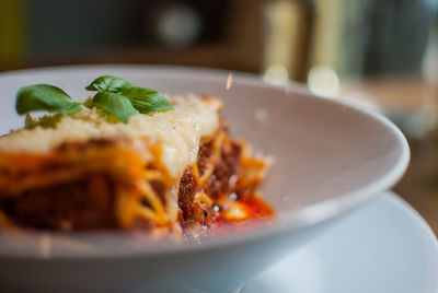 Close-up of lasagna served in bowl