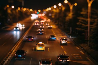 High angle view of traffic on city street at night