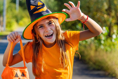 Portrait of smiling girl wearing halloween costume