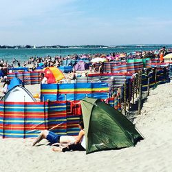 View of beach against blue sky
