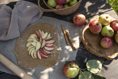 Still life with raw apple pie