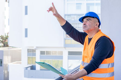 Portrait of young man using digital tablet