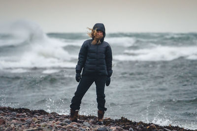 Full length of man standing at beach