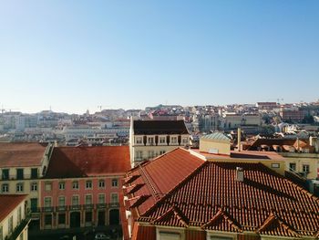 High angle view of houses against clear sky