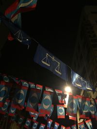 Low angle view of illuminated building at night