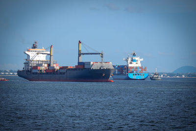 Ship in sea against sky