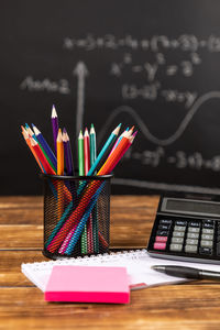 Close-up of office supplies on table