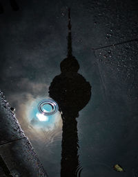 High angle view of puddle with reflection in lake