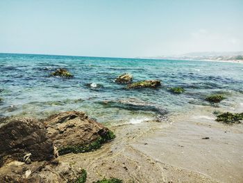 Scenic view of sea against clear sky