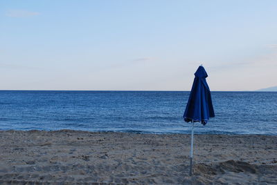 Scenic view of calm sea against sky