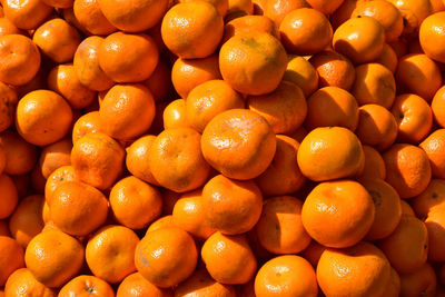 Full frame shot of oranges at market stall