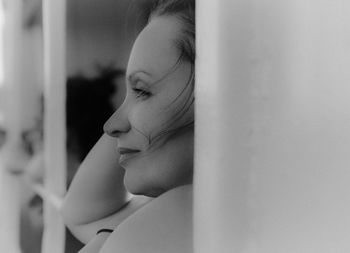 Close-up portrait of woman looking away