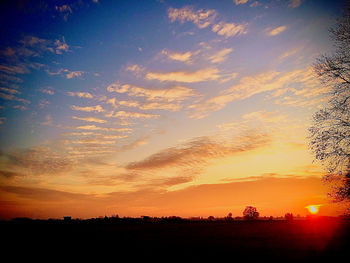 Scenic view of silhouette landscape against sky during sunset