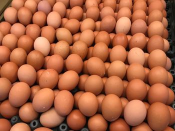 Full frame shot of eggs for sale at market