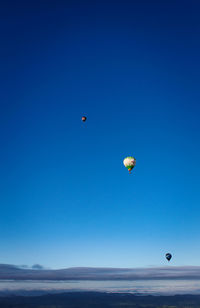 Hot air balloons flying in sky